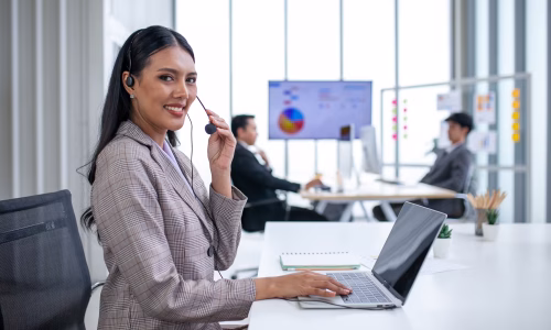 female-operator-agent-with-headsets-and-her-team-w-2024-12-06-19-46-47-utc