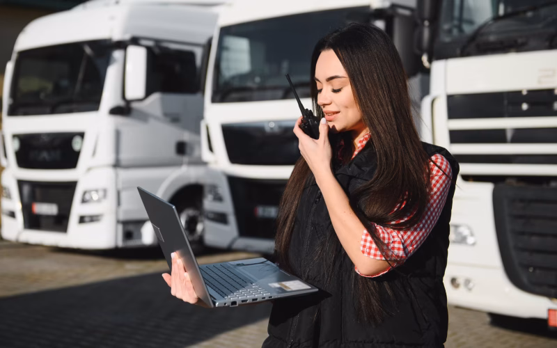 woman-truck-driver-talking-by-radio-female-trucke-2025-12-08-18-16-36-utc